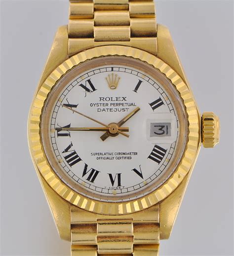 rolex oyster pertual datejust womans 18k gold